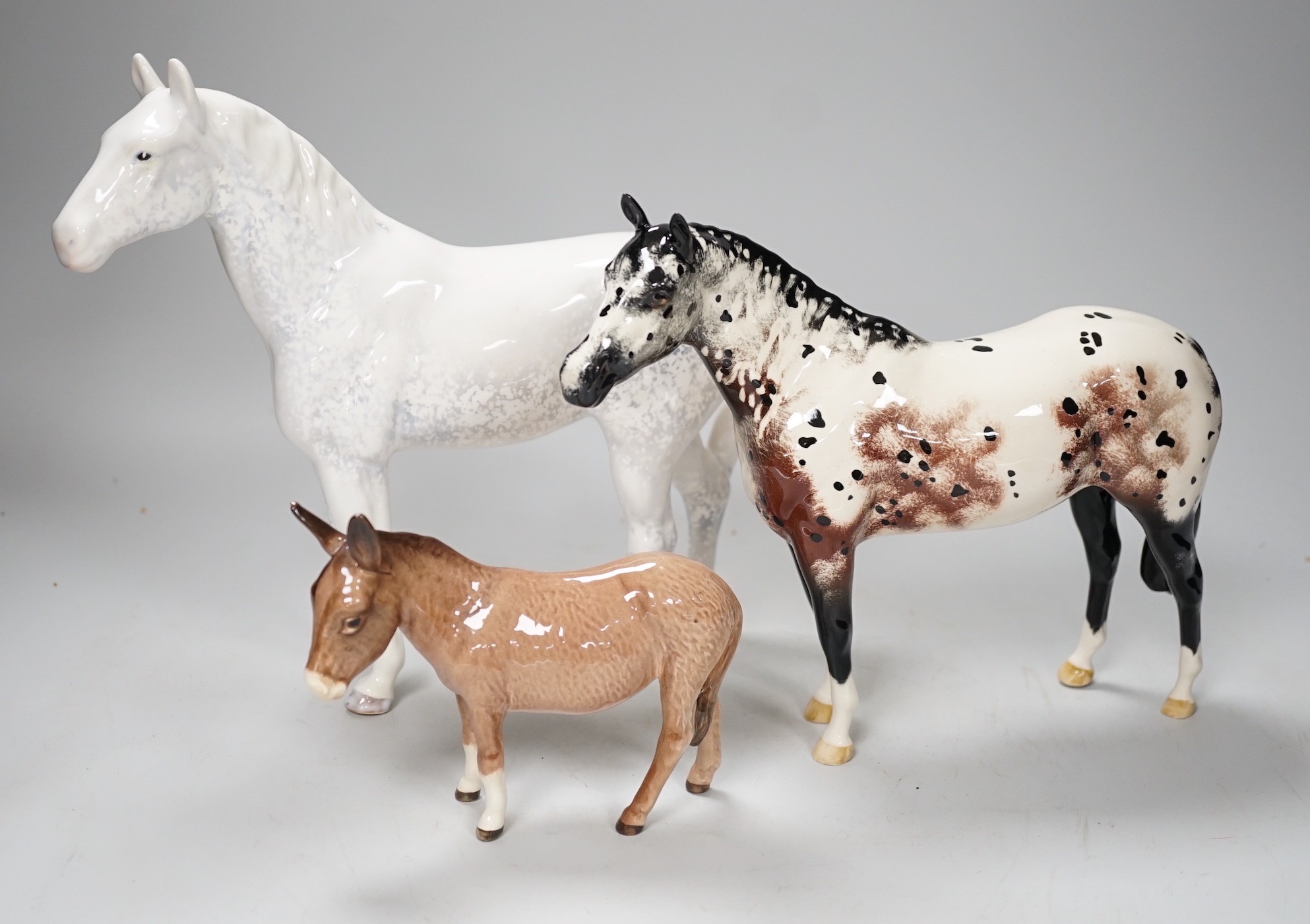 Three ceramic horse models, to include Beswick, Doulton, Sylvac, tallest 23cm